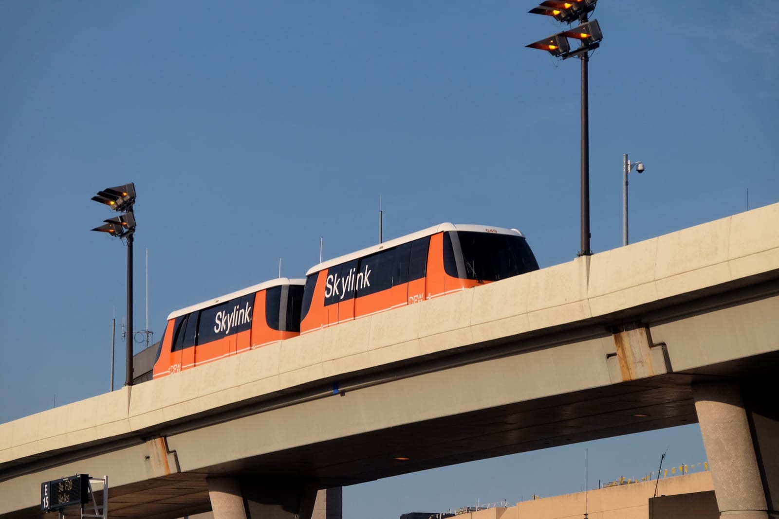 The DFW Skylink train running near Terminal E at DFW Airport
