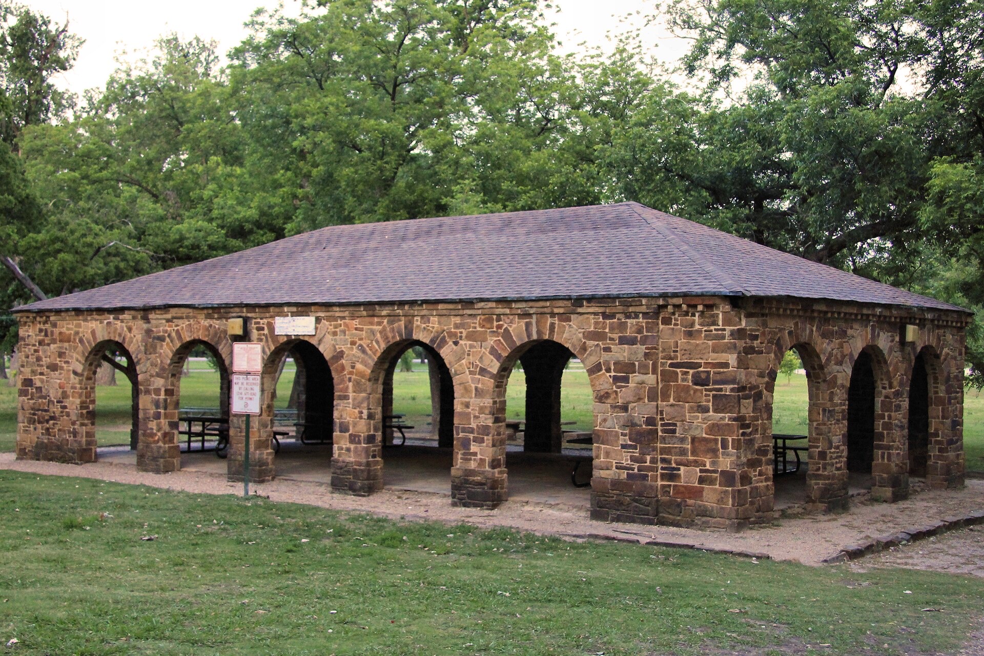 A stone picnic pavilion at White Rock Lake Park in Dallas
